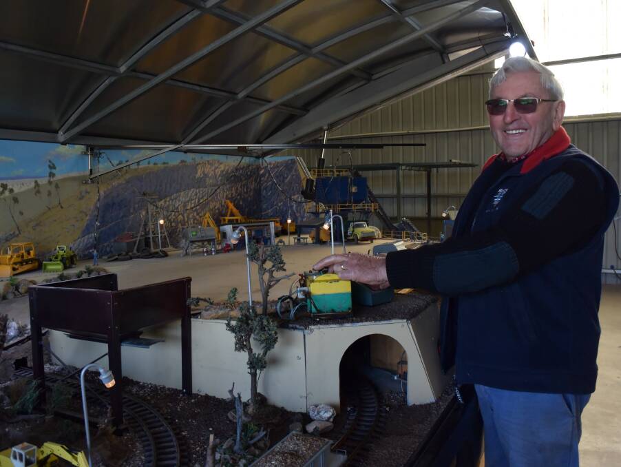 Barry Blenkhorn works the controls of the quarry's electronics. He takes the trailer holding the set to shows around Tasmania.