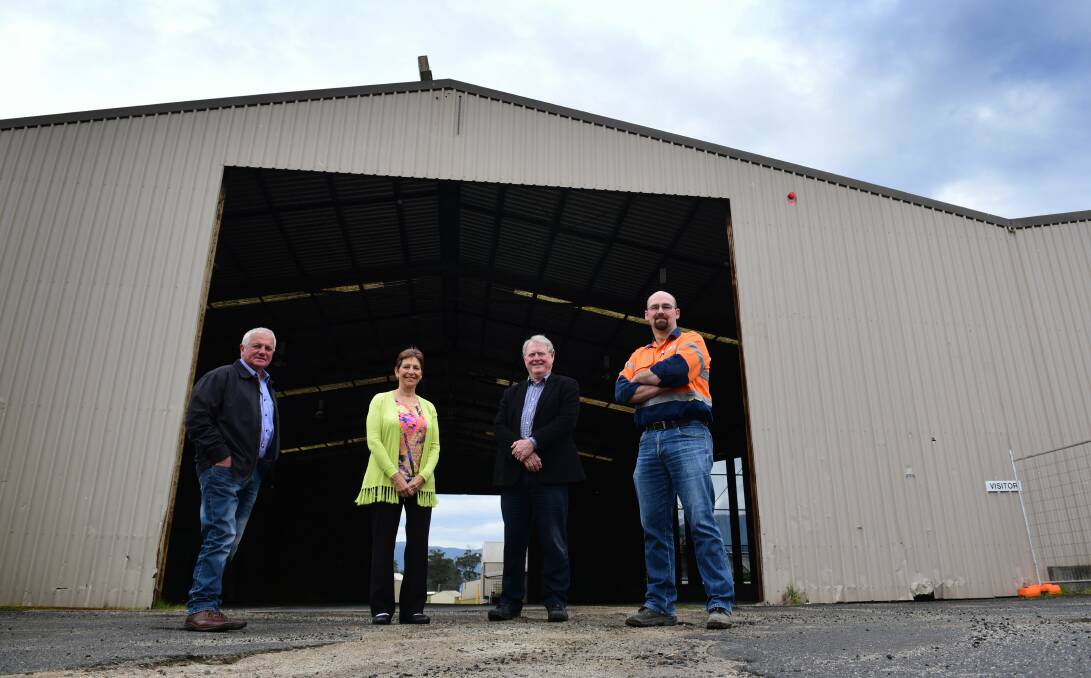 DEDICATED: Dorset Renewable Industries' Ken and Karen Hall, David Hamilton and Dale Jessup outside a restored shed. Picture: Paul Scambler