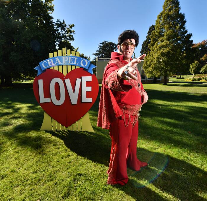 LOVE ME TENDER: Adam Page as Elvis Presley, with his 'Chapel of Love' set at Launceston's City Park. Picture: Scott Gelston 