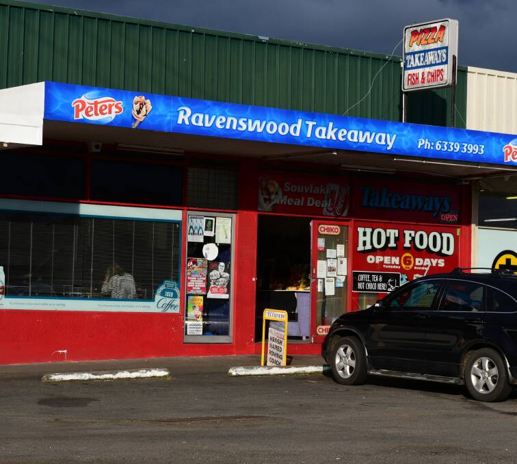 HOLD-UP: Someone in a motorcycle helmet robbed Ravenswood Takeaway on Thursday night. Picture: Paul Scambler