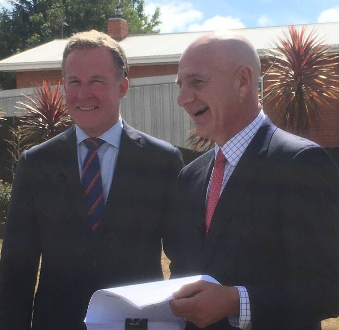 Premier Will Hodgman and Planning Minister Peter Gutwein unveil the new statewide planning scheme at Prospect on Wednesday.