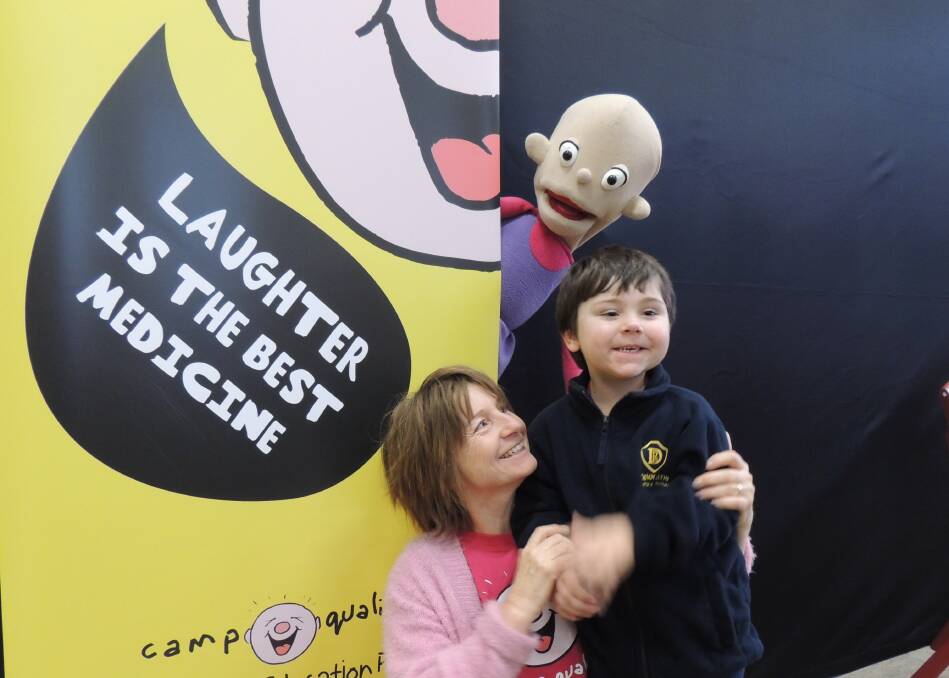 LAUGHTER: Joanne Herby with her grandson Jacob, 5, who is recovering from leukaemia, and Camp Quality puppet Kylie, at Deloraine Primary School.