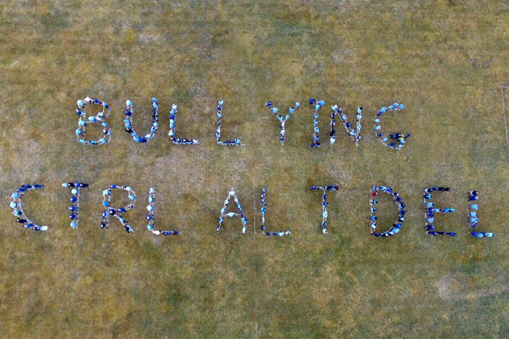 The drone photo taken at Deloraine High School of students spelling out 'Bullying ctrl-alt-delete' on the school oval.