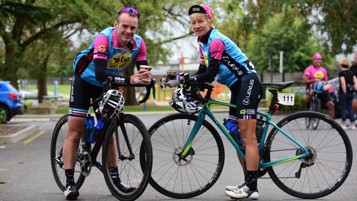 RIDING FOR A CAUSE: Chrsi Richardson, of Sydney, and Wendy wood, of Melbourne, take a break at Royal Park in Launceston. Picture: Paul Scambler