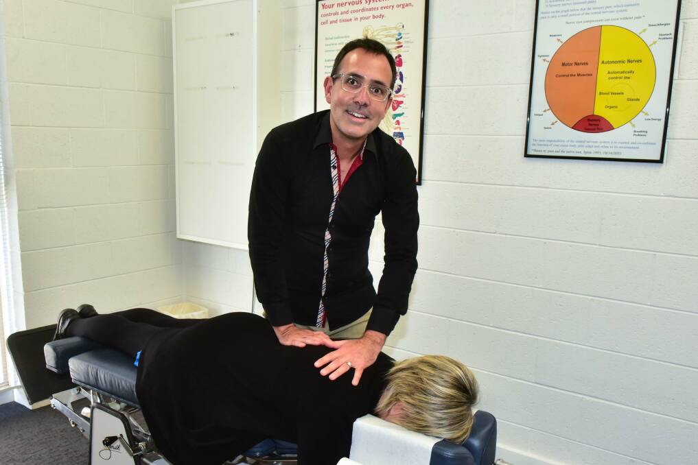 CRACK: Chiropractor Roberto de Souza at work at Tamar Chiropractic in Launceston during Spinal Health Week 2017. An estimated 3.7 million Australians have chronic back pain. Picture: Neil Richardson