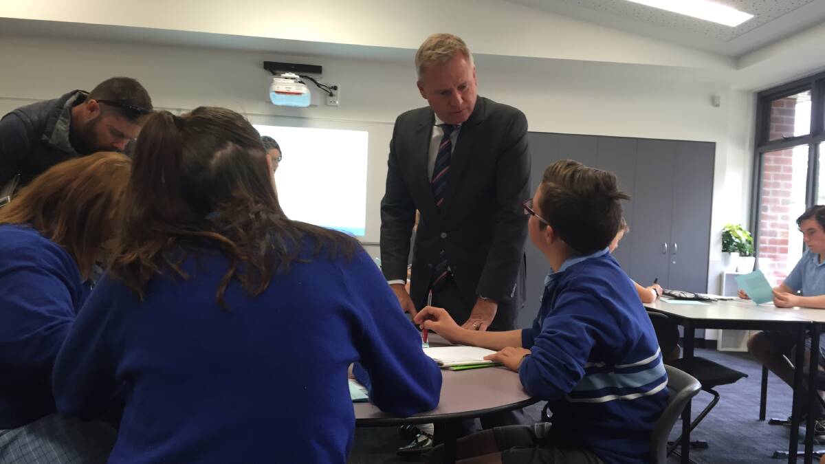 BACK TO SCHOOL: Education Minister Jeremy Rockliff meets students at Kings Meadows High School on Wednesday. Picture: Carly Dolan