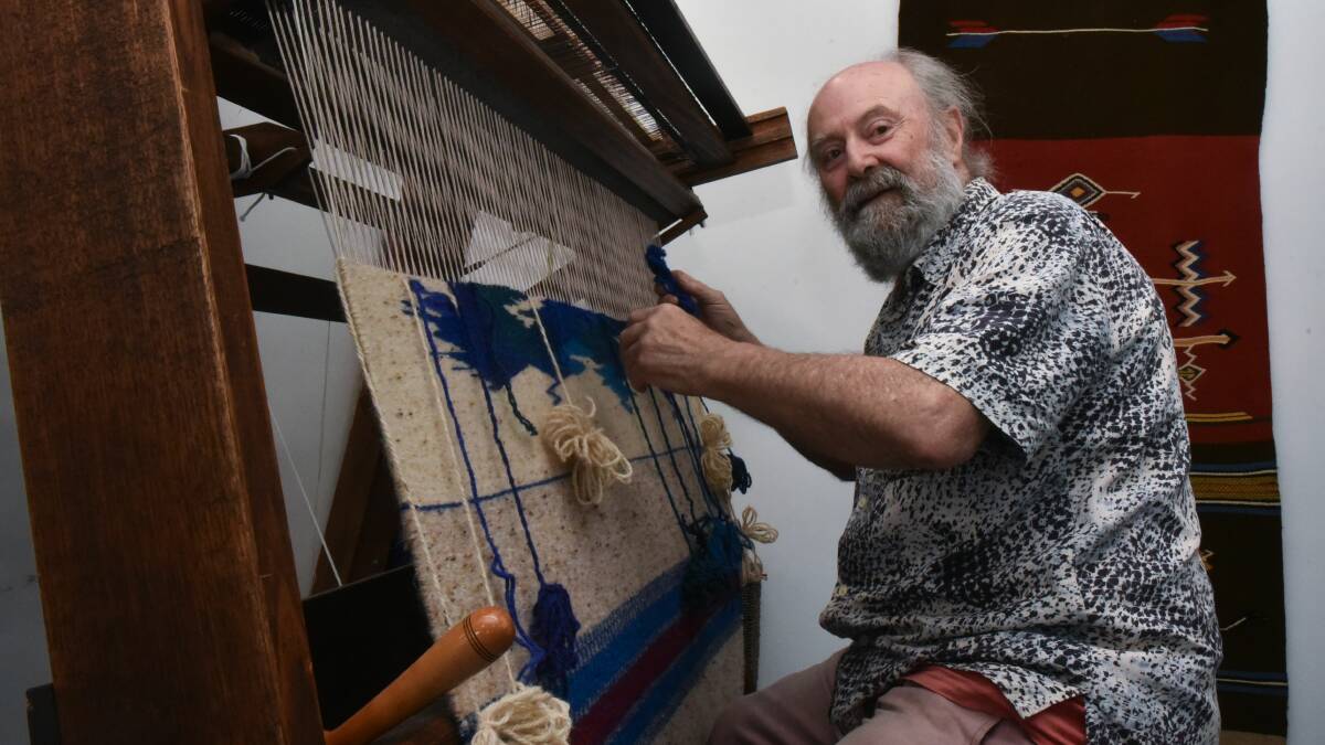 Jackeys Marsh weaver Jim Deghand, who has been a spinner, dyer and weaver for 40 years, works on hist latest piece in his exhibition and workspace at DCS.