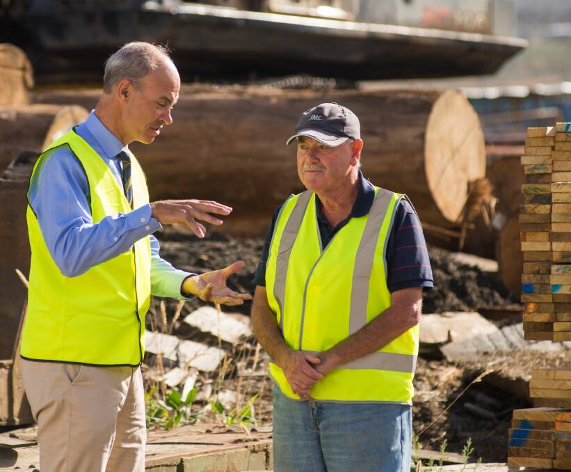 NEW DAWN: Resources minister Guy Barnett explains the proposed legislation to Barbers Mill owner Graeme Barber in Launceston. Picture: Phillip Biggs