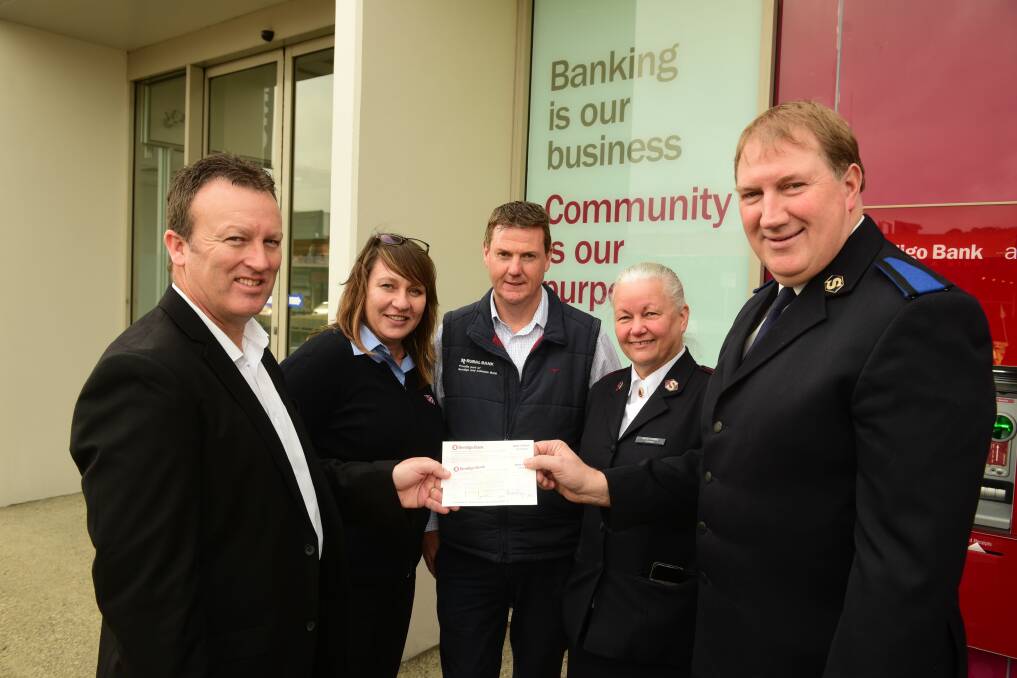 Bendigo Bank's Stewart Nankervis presenting the cheque to Salvation Army's Stuart Foster, with Bridget vande Kamp, Dean Lalor and Jacky Laing. Picture: Paul Scambler