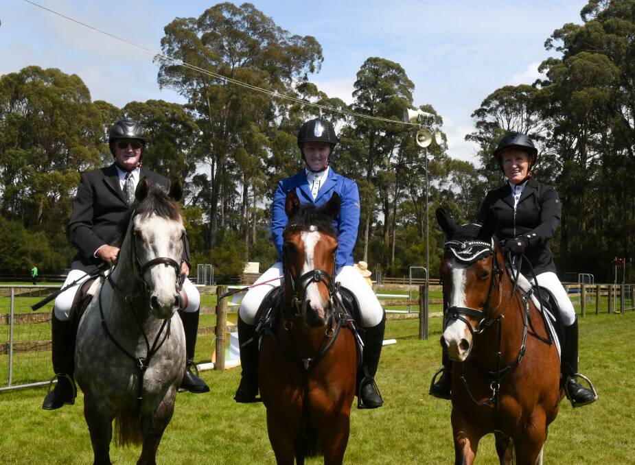 A FAMILY AFFAIR: Winston Pilgrim with his daughter, Elesha Spillane, and wife, Debbie, at the Australians Masters Games equestrian showjumping in Ulverstone on Friday. Picture: Neil Richardson