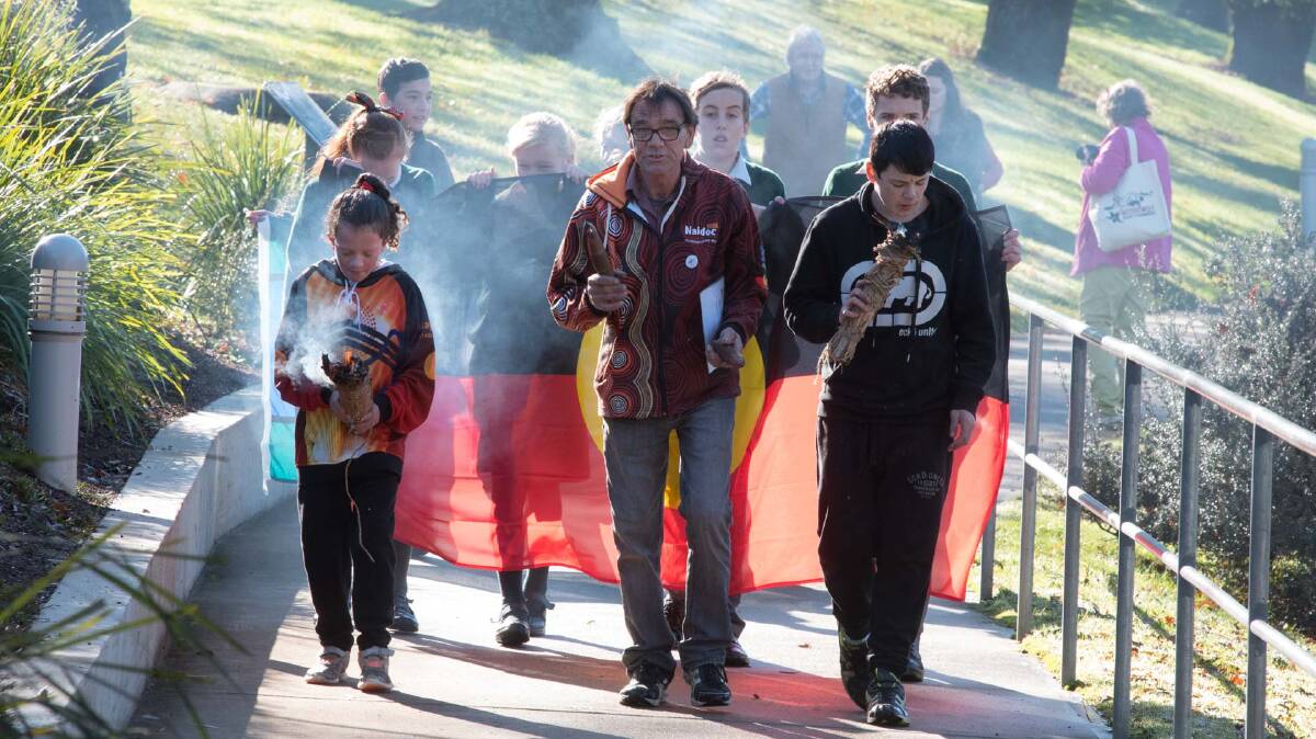 Hank Horton leads a crowd of more than 400 to Deloraine's Yarning Circle for the town's NAIDOC Week celebrations in 2017. Picture: Neil Richardson 