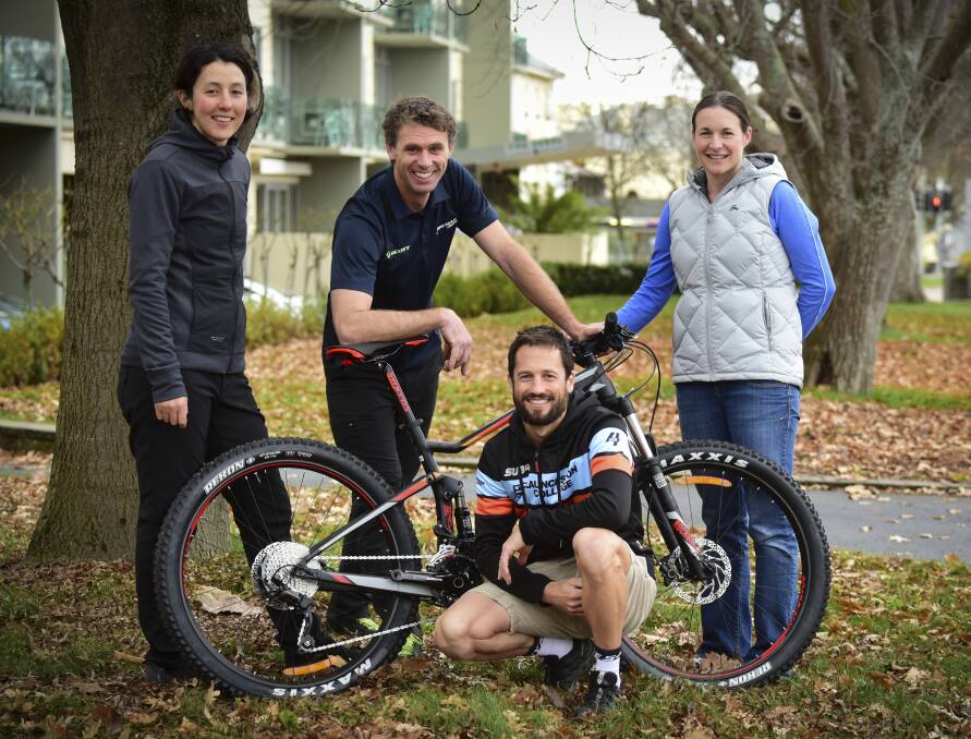 TAKEOVER: Tasmanian adventure sport leaders Rowena Fry, Ben Mather, Mark Padgett and Louise Padgett will co-ordinate the Freycinet Challenge this year for the first time. Picture: Paul Scambler