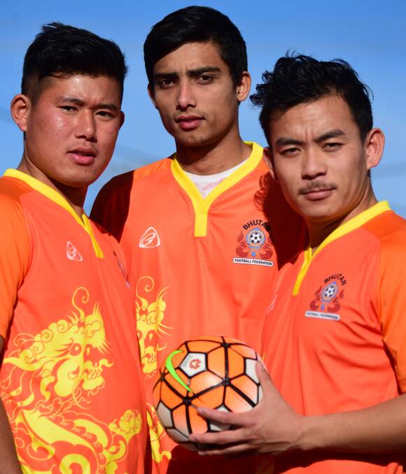 READY TO PLAY: Launceston soccer players Deo Ay, Narayan Karki and Mx Pooma. Picture: PAUL SCAMBLER