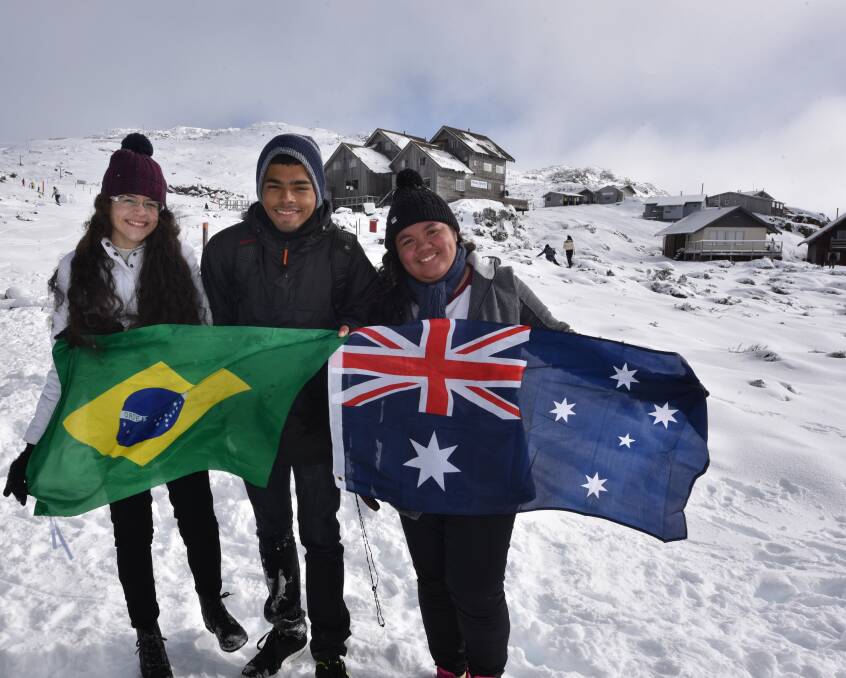 FIRST SNOW: Exchange students Jose Vinicius 16, Kamila Almeida 16 and Rhaira da Silva 17, all of Brazil visited Ben Lomond to see snow for the very first time. Pictures: Paul Scambler
