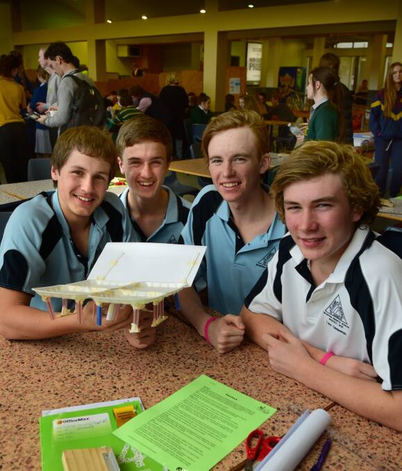 SCIENCE AND ENGINEERING: Mountain Heights School students Jack Nankivell, 15, Lachlan McKellar, 16, Tylar Lockett, 15, and Luke Gaspersil, 15. Picture: Paul Scambler