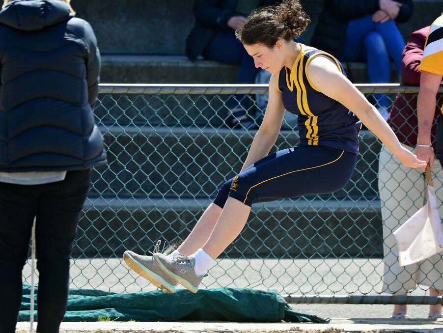 AIRBORNE: Mount Carmel College long jumper Bella Buissink strives for distance.
