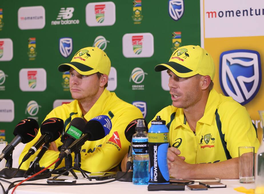 NOT HAPPY: Steve Smith and David Warner at the press conference after Australia's fifth-straight ODI loss against South Africa in Cape Town. Picture: Getty Images