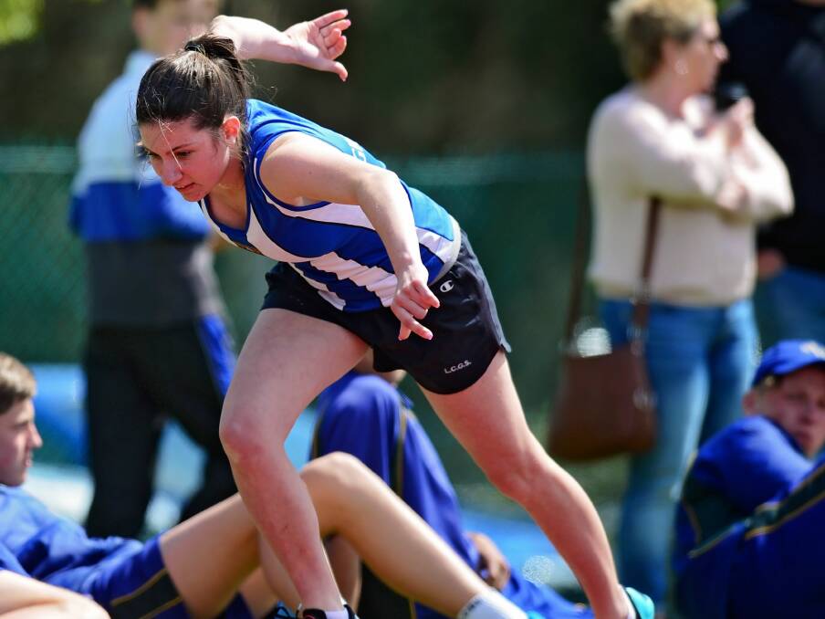 THEY'RE OFF: Launceston Grammar School runner Mel Harris at the start of her 400-metre under-16 run.
