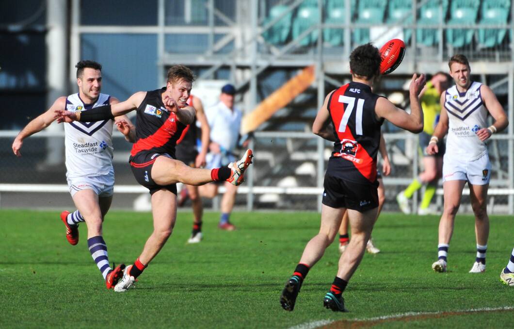 DEFENDING: North Launceston's Jay Foon clears the ball out of defence in their last clash against Burnie at Aurora Stadium two weeks ago. Picture: Scott Gelston