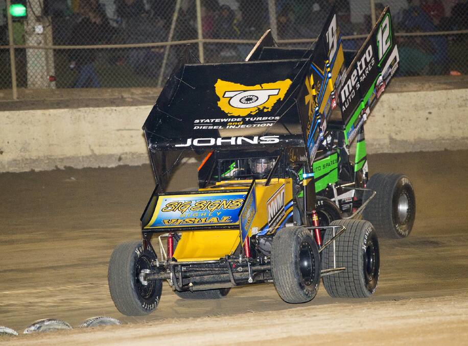 WINNER: Chris Johns on his way to winning the sprintcar final at Latrobe. Picture: Angryman Photography