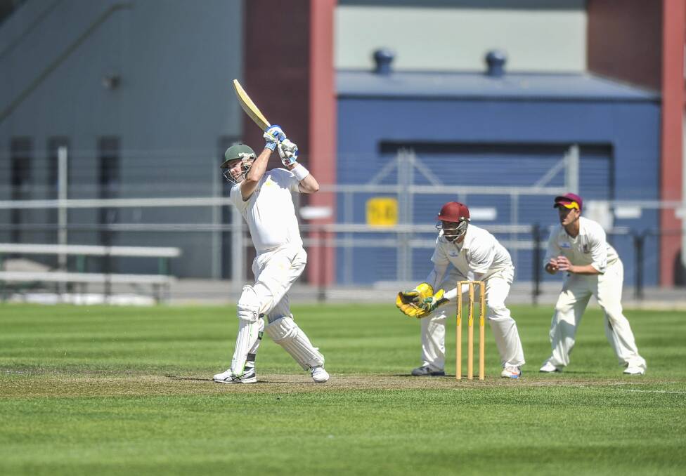 South Launceston batsman Jeremy Jackson opens the shoulders while batting to eventually go one and top score with 63.