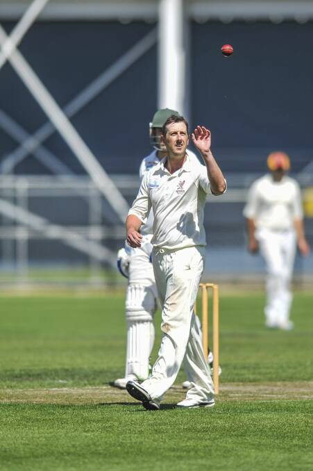 NEEDING WICKETS: Mowbray's Clinton Reid returns to his mark to send down a delivery against South. Pictures: Scott Gelston