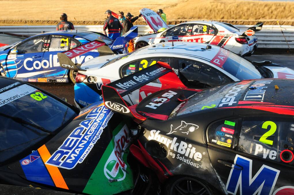 CARNAGE: A mass of damaged Supercars after an extraordinary pile-up involving 12 cars at Symmons Plains on Saturday. Picture: Paul Scambler