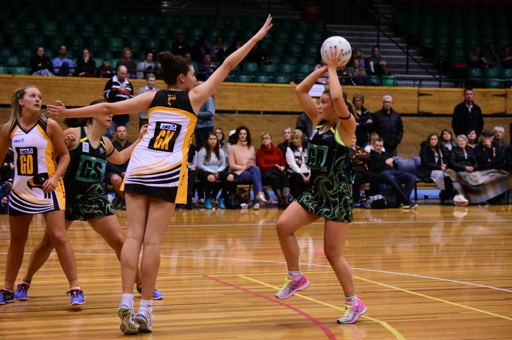 RIVALS: Northern Hawks and Cavaliers doing battle last season at the Silverdome. The two Launceston state netball clubs begin their 2017 flag quests on Saturday.