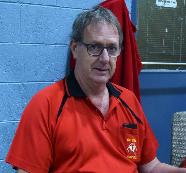 REFEREE: Peter Cocker has travelled all over the country and the world officiating at badminton tournaments including the Olympic Games. Picture: Neil Richardson