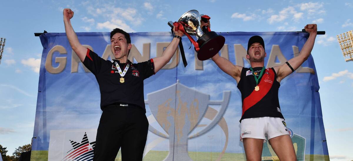 Cup tied: Coach Zane Littlejohn and captain Taylor Whitford celebrate North Launceston's 2015 State League grand final win over Glenorchy at Bellerive Oval.
