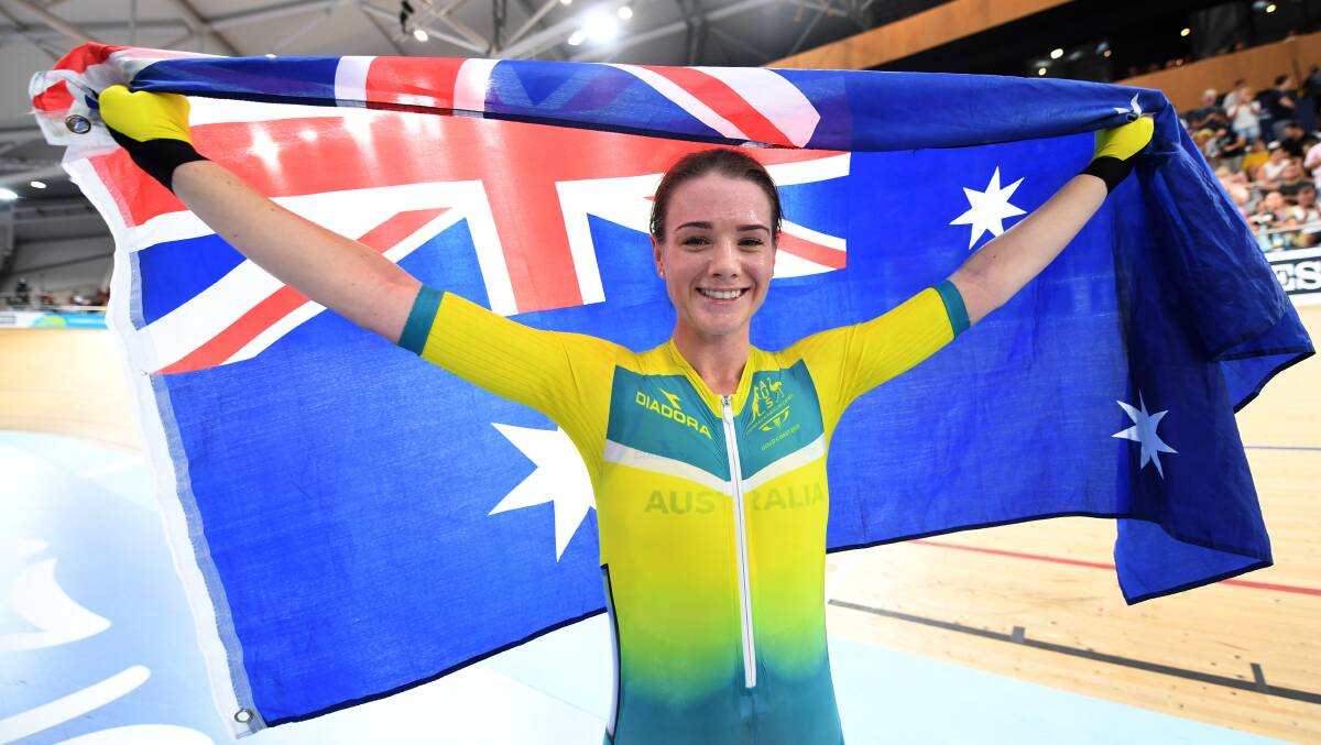  Aussie pride: Amy Cure after her win on Sunday in the women's scratch race at the Gold Coast Commonwealth Games. Picture: AAP Image/Dan Peled