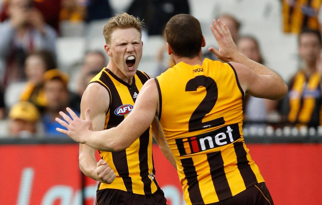 CELEBRATION TIME: James Sicily and Jarryd Roughead at the MCG on Sunday. Picture: Getty Images