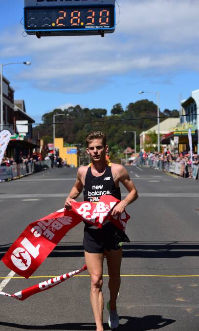 BACK-TO-BACK MAN: Brett Robinson crosses the line to win the 2016 Burnie Ten on Sunday. Picture: Paul Scambler