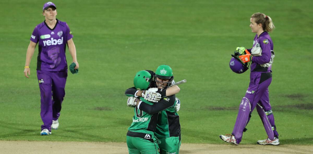 BIG WIN: Jess Cameron and Morna Nielsen celebrate the Melbourne Stars' win over Hobart on Friday. Picture: Getty Images