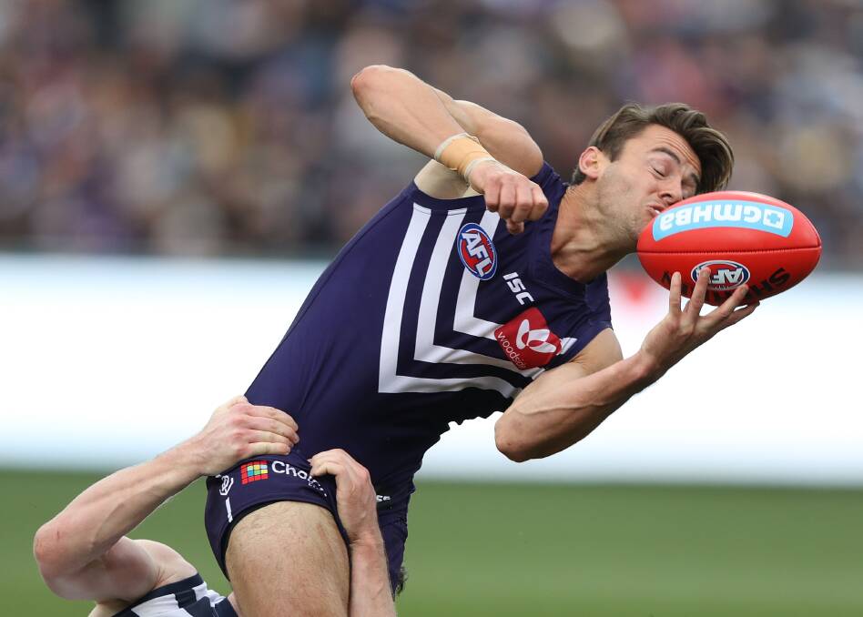 EYES ON IT: Lachie Weller in action against Geelong on Sunday.