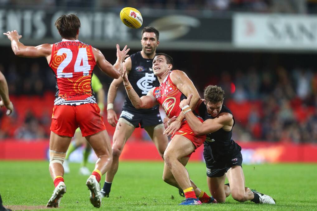 UNDER THE PUMP: Jesse Lonergan is put under pressure in Carlton's win over Gold Coast. Picture: Getty Images 