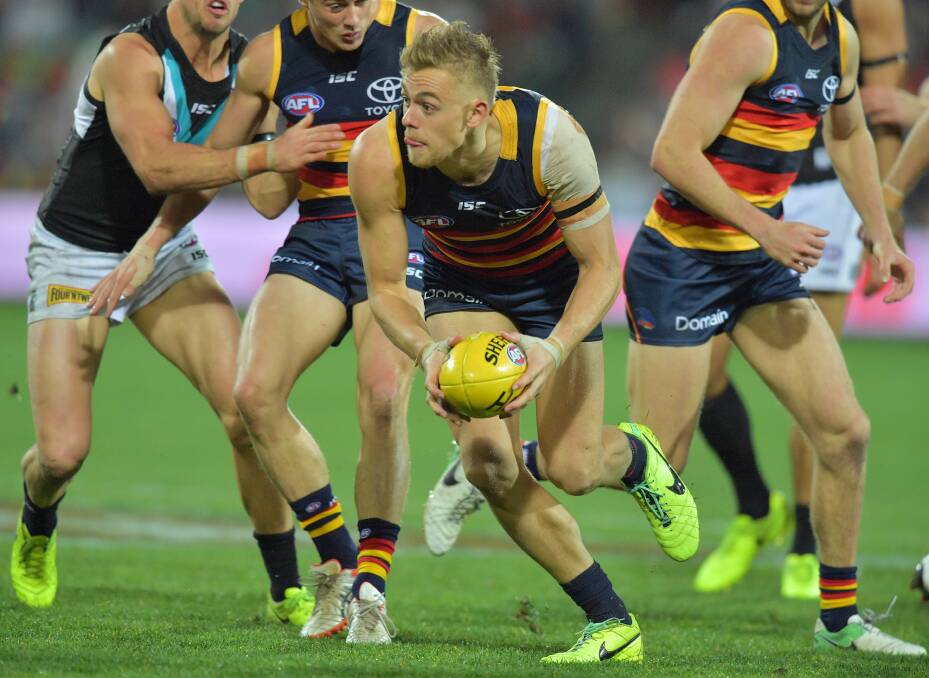 Hugh Greenwood looks for an Adelaide teammate earlier this season. Picture: AAP
