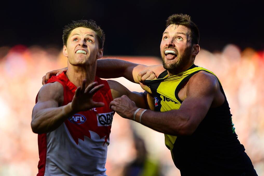 ONCE WERE FRIENDS: Toby Nankervis contests the ruck with Callum Sinclair during Richmond's loss to Sydney. Picture: Getty Images