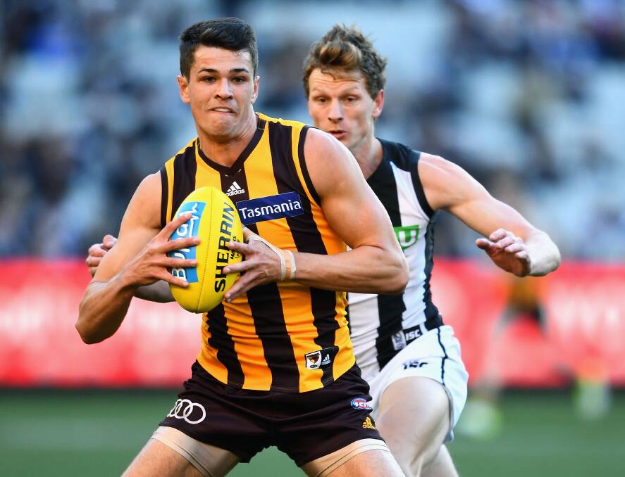 RISING STAR ONE: Ryan Burton in action against Collingwood. 