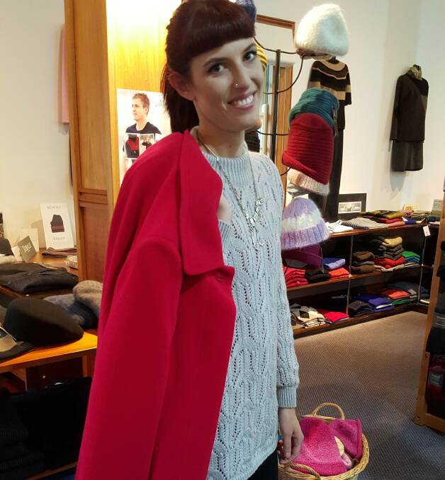 In Style: Only Merino jumper paired with a red Kesta coat all from Tasmania Wool Centre. 