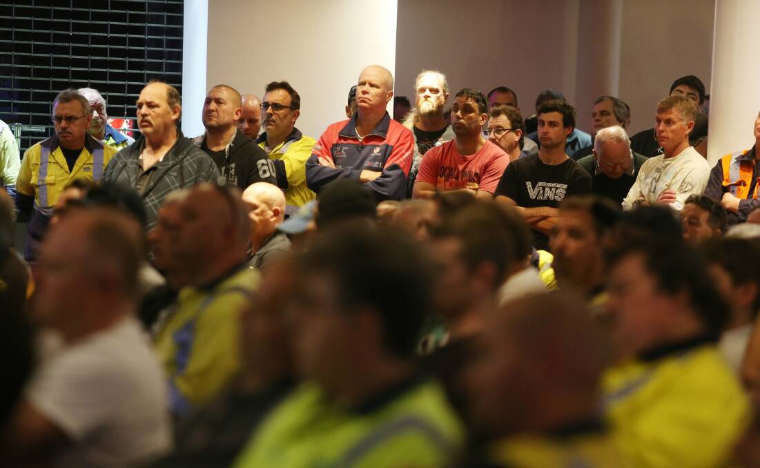 BIG VOTE: Steelworkers hear the bad news about job losses and cuts to conditions. But they still voted 'yes', even though the deal hurt them. Picture: ROBERT PEET