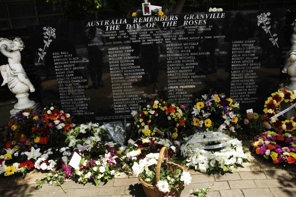 Never forgotten: The Granville Railway Disaster Memorial Wall lists the names of the 83 people killed on January 18, 1977. Picture: Parramatta-Holroyd Sun