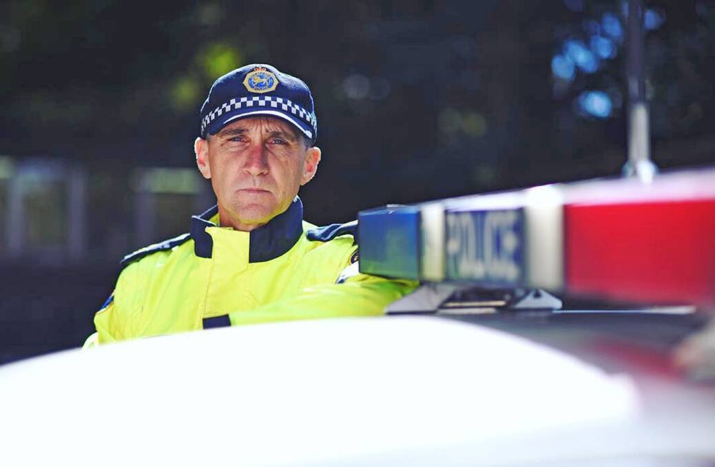 Tasmania Police's crash investigator Nicholas Clark is reminding Tasmanians to buckle up. Photo: Scott Gelston