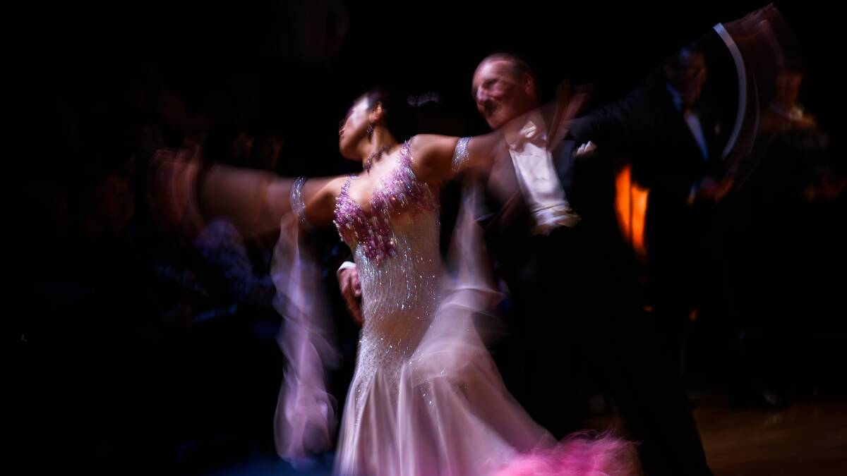 Ian Wadsley and Anna Zhans dance up a storm at the 2017 Tasmanian Dance sport Championship. This image was shot with a moderately slow shutter speed (1/10th of a second) whilst panning the camera (tracking the subject)  to give some movement to the dancers  Picture: Scott Gelston.