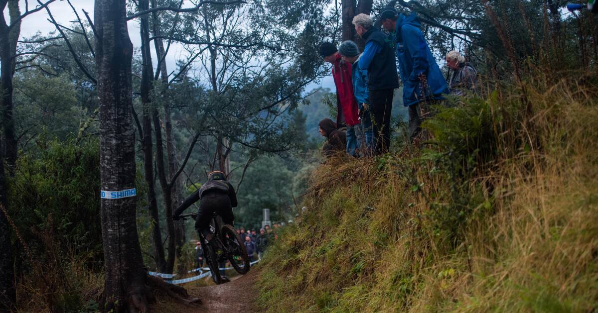 Captivating: Spectators watch a competitor make the final jump of the event on the way downhill to Derby.