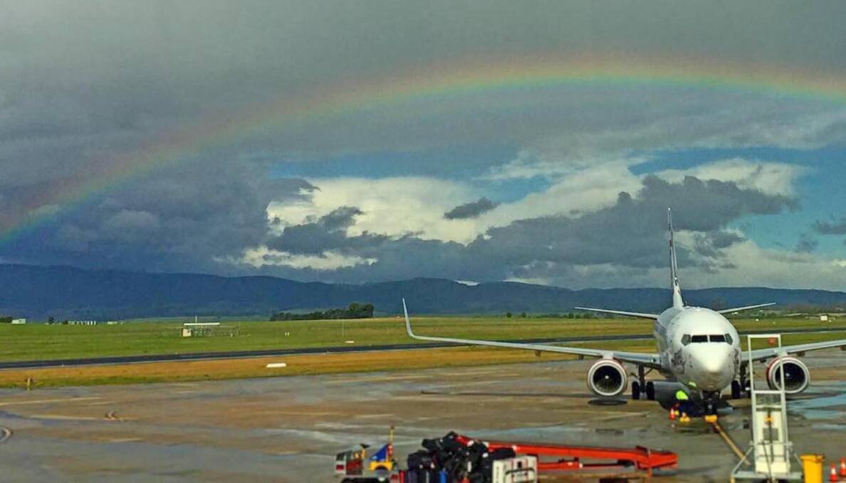 A rainbow crosses the sky as the Australian Diamonds and New Zealand Silver Ferns netball teams arrive in Launceston. Picture: Scott Gelston