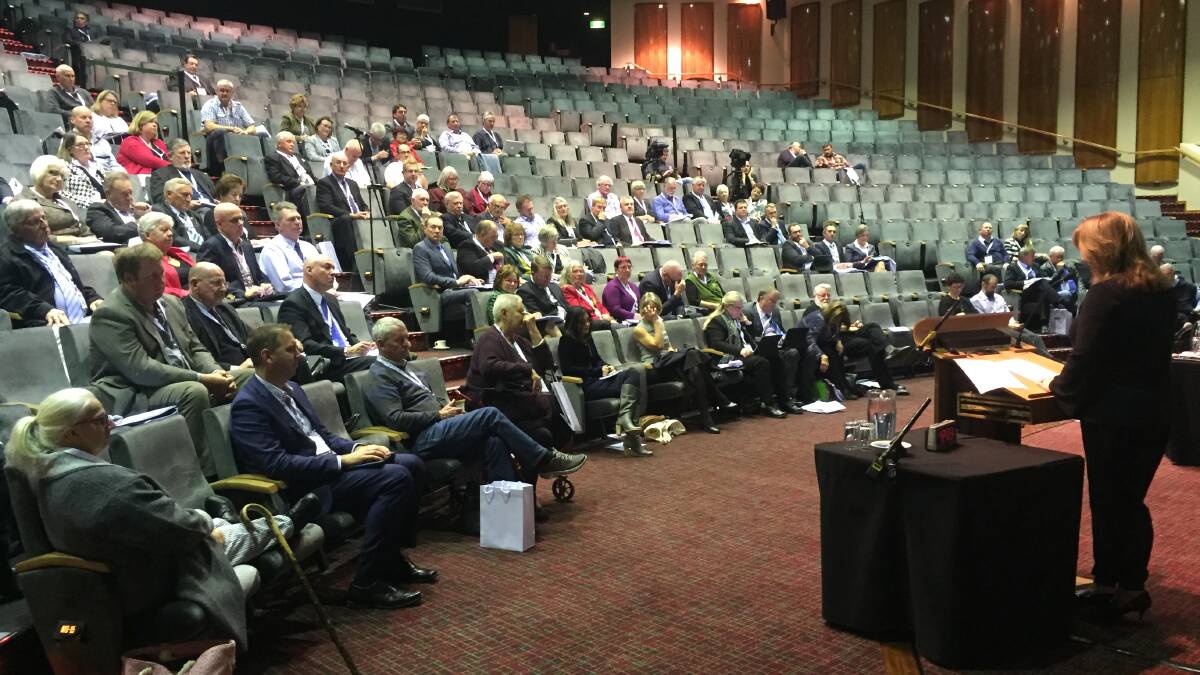 Delegates at the LGAT annual conference listen to an address from Labor's local government spokeswoman Madeliene Ogilvie.