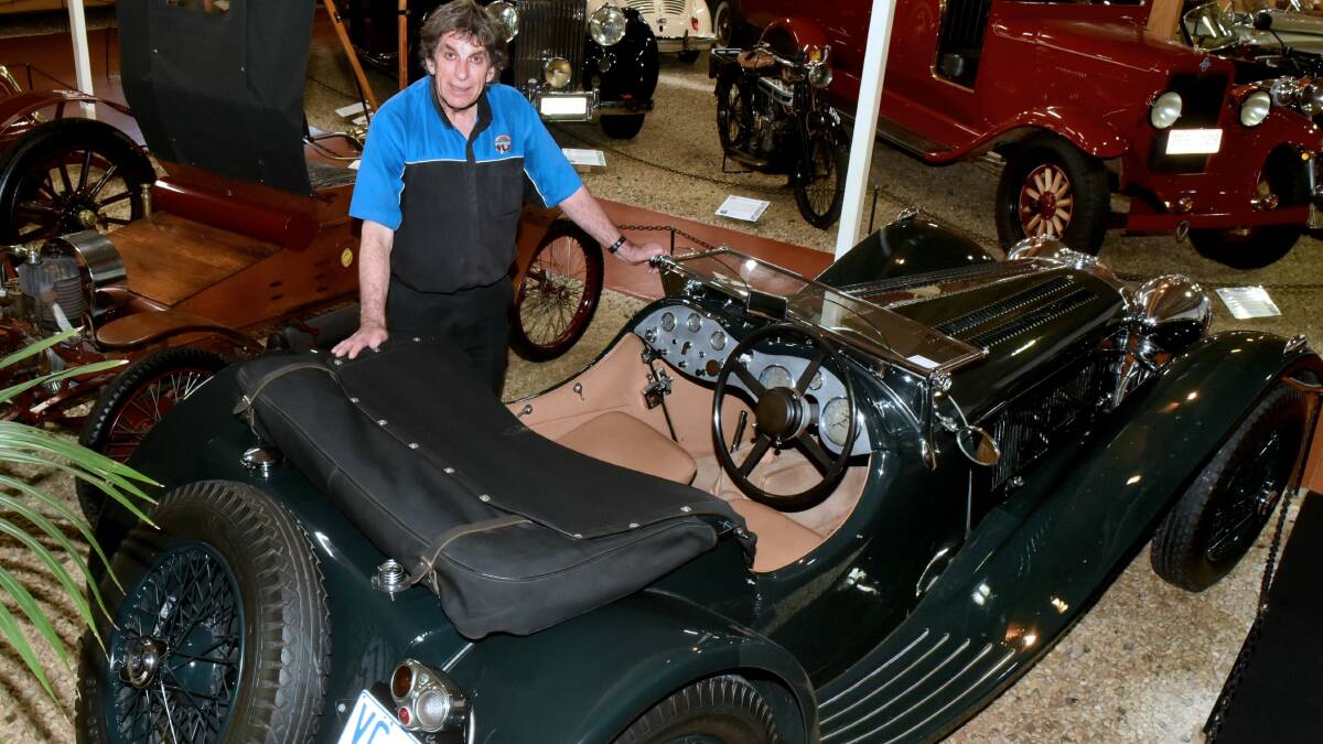 CLASSIC: Phillip Dean with a 1937 SS100 Jaguar. The National Automobile Museum of Tasmania is hosting seniors weekend this Saturday and Sunday. Picture: Neil Richardson.