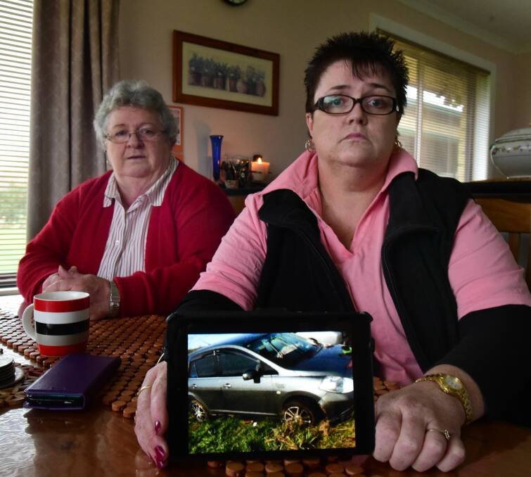 DEVASTATED: Melinda Wellard shows a picture of her car, with her mother Colleen Wellard. Picture: Paul Scambler.