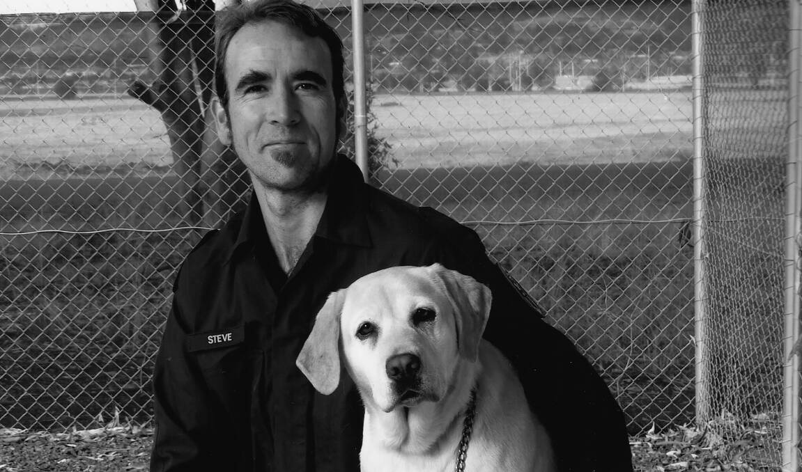 BOND: Dog Handler Steve Kelleher with detector dog Elise. Picture: Supplied
